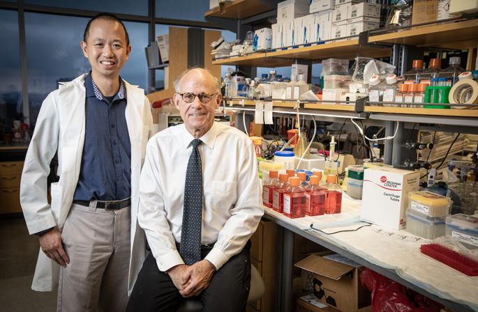 Drs. Ken Lau and Bob Coffey are pictured in their VUMC lab.