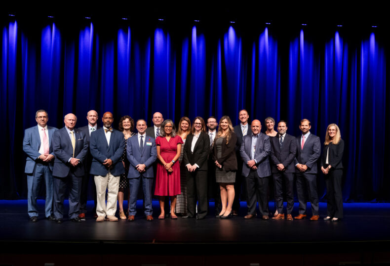 VUMC faculty named to new directorships are pictured on the stage at 