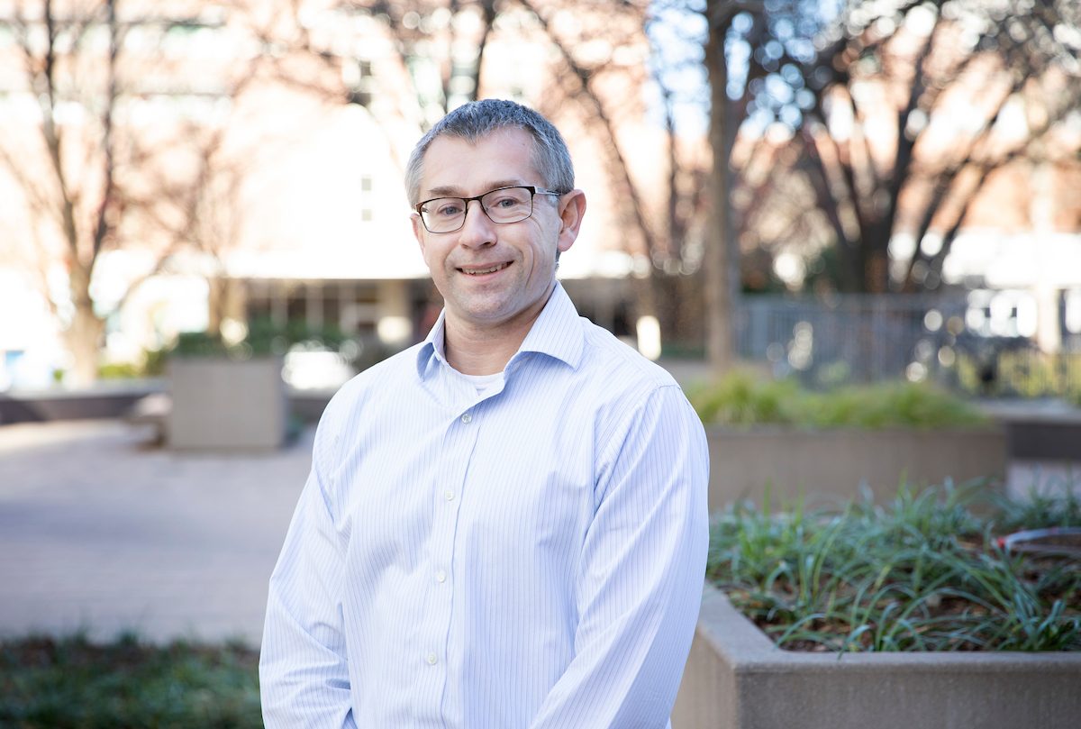 Dr. Jonathan Kropski poses for an outdoor portrait at the VUMC campus.