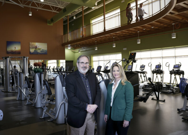 David Hines of MNPS and Martha Shepherd, DO, MPH, of VUMC, pose in a wellness center.