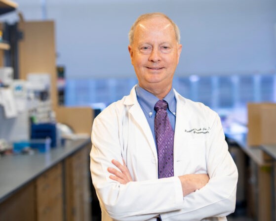 Dr. Richard Peek poses for a portrait in his lab at VUMC.