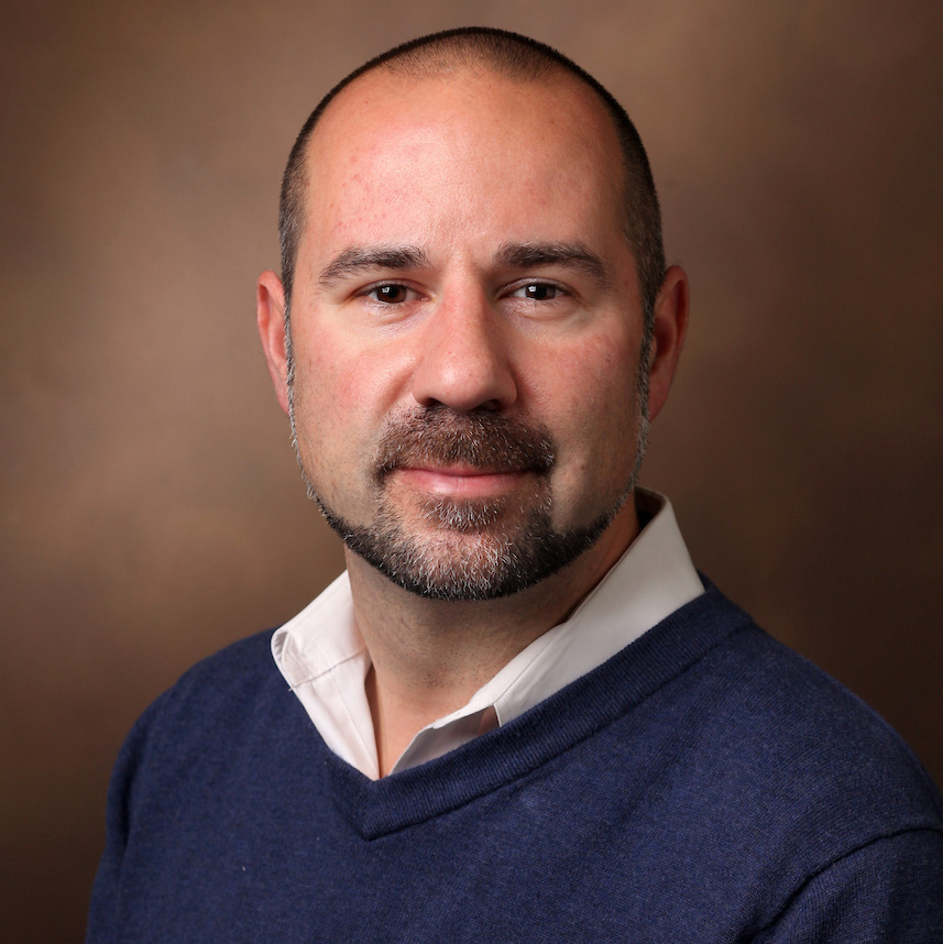 Dr. Justin Balko headshot