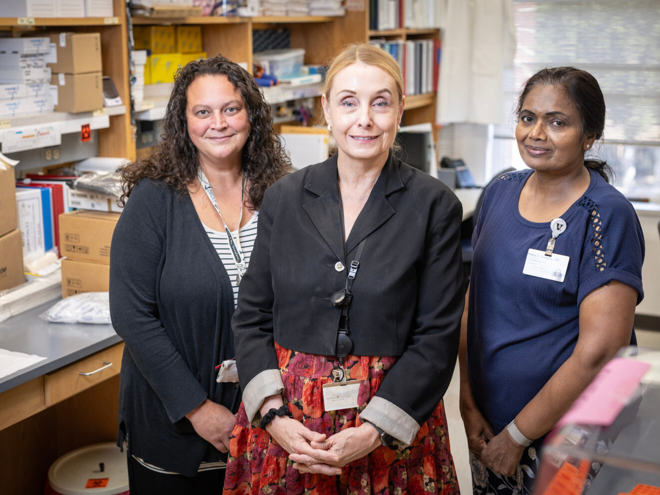 Dr. Elizabeth Phillips, center, with colleagues in the Center for Drug Safety and Immunology; from left, Research Fellow Amy Palubinsky and Senior Research Specialist Rama Gangula.
