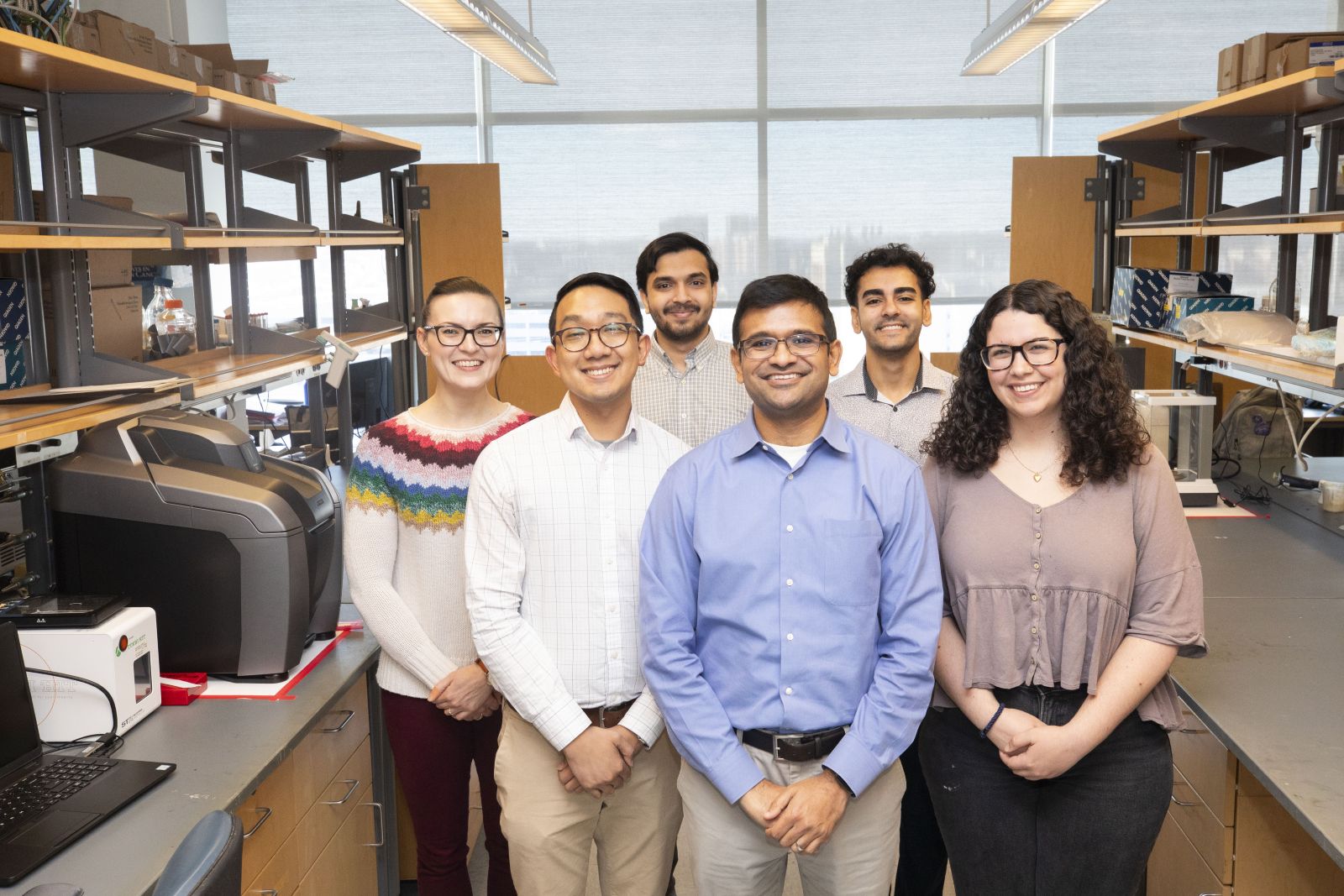 Six members of the Choksi lab pose in their Vanderbilt research lab.